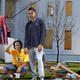 The Obamas survey the devastation wearing only the clothes they had time to take before the storm struck.